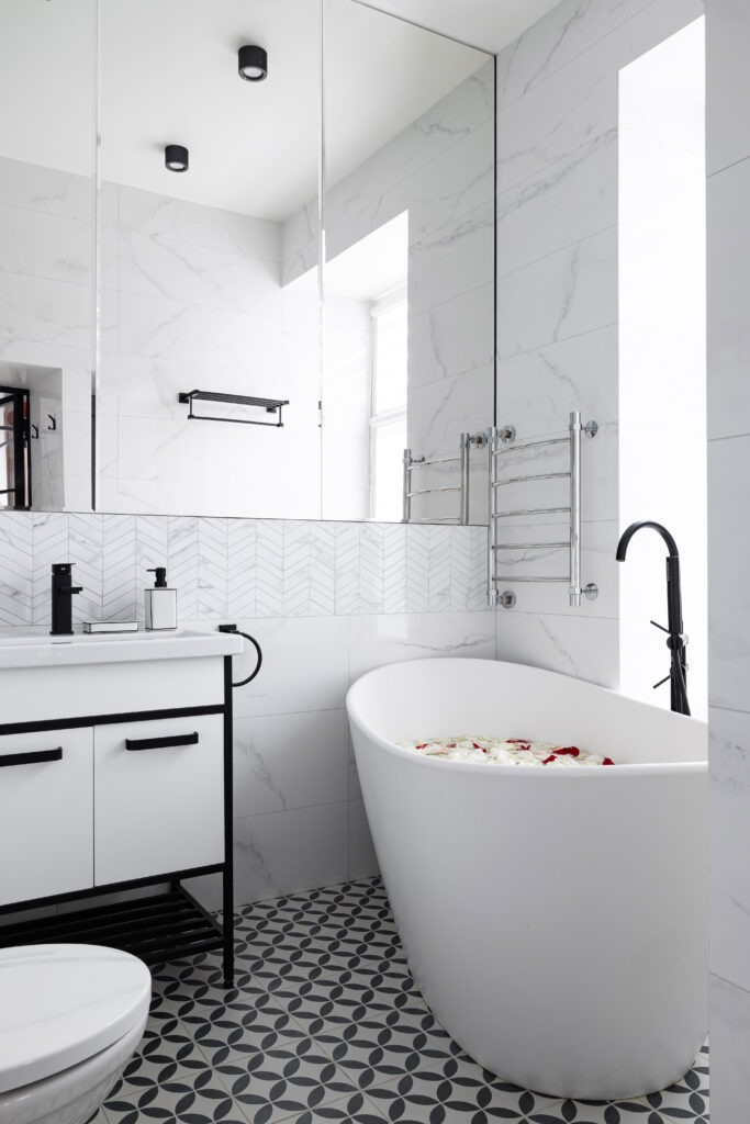 A Stunning and Elegant Modern Bathroom Featuring a Luxurious Freestanding Bathtub and Stylish Decor