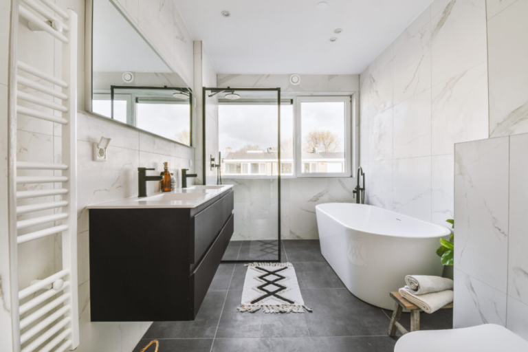 modern-bathroom-with-bathtub-shower-next-to-the-w-2025-02-10-09-55-45-utc-1