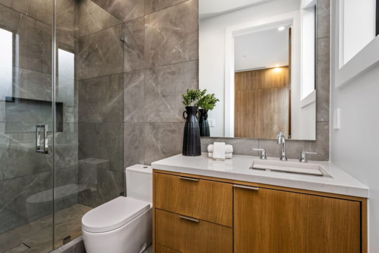 modern-bathroom-with-wooden-vanity-and-glass-showe-2025-02-10-06-40-44-utc-1