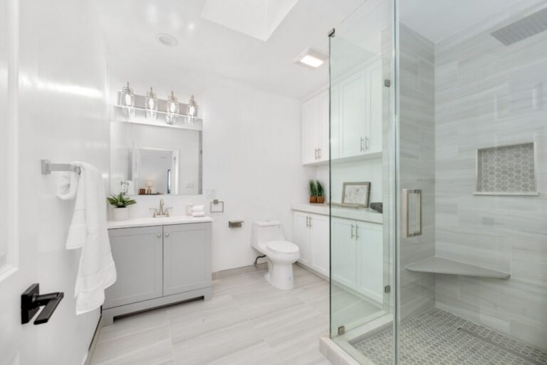 Modern white bathroom with glass shower