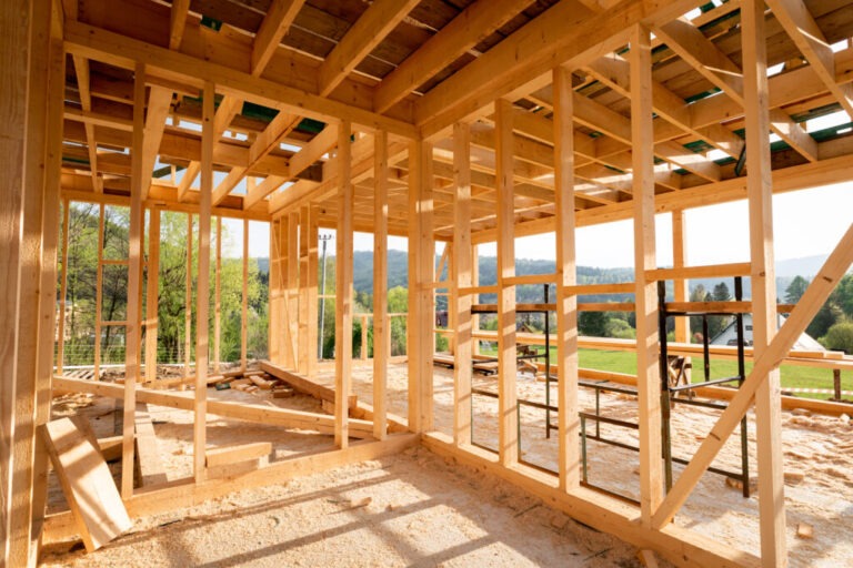 New interior residential wooden construction house framing