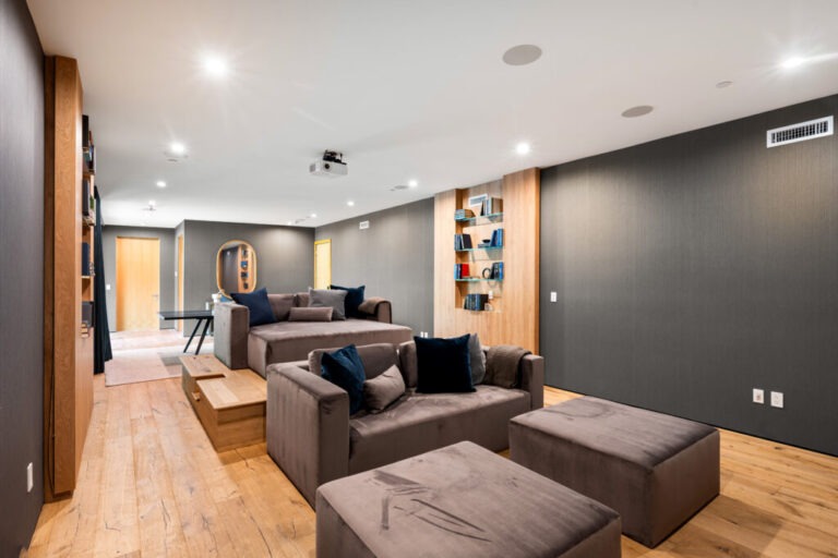 Stylish and cozy home theater with elegant decor and wooden accents
